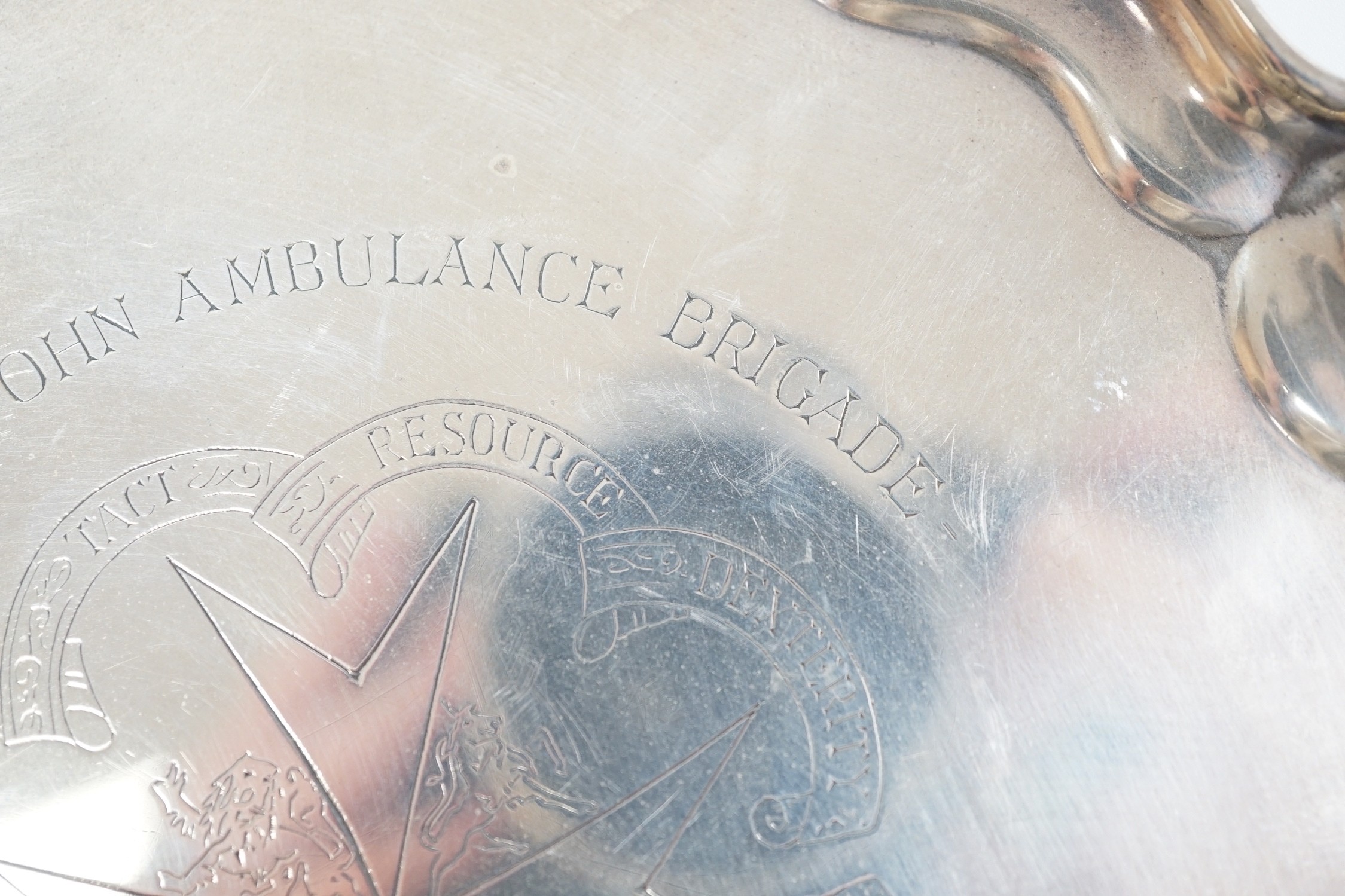A modern silver presentation small tray, with engraved inscription relating to the St John Ambulance Brigade, Hong Kong, Birmingham, 1974, 15.6cm, 4.2oz.